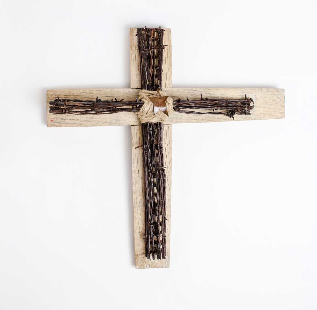 Cross of many strands - antique barbed wire