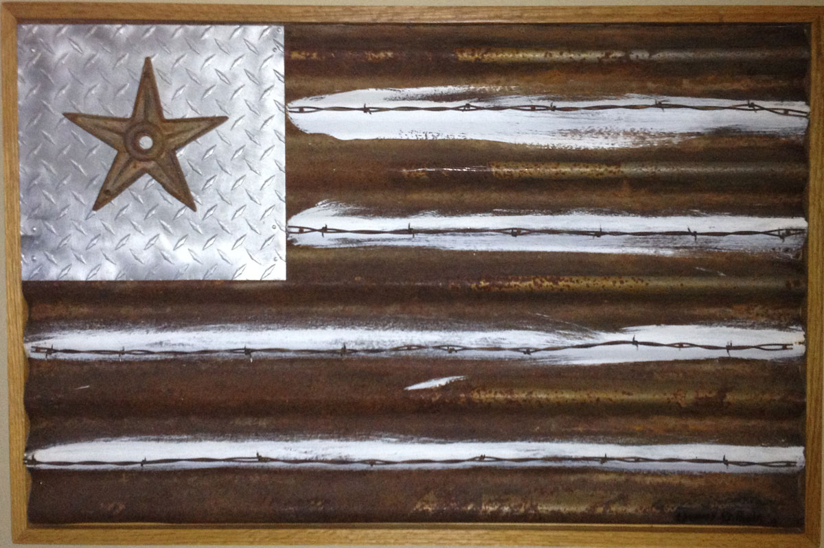 Prairie Patriot flag- corrugated metal, barbed wire