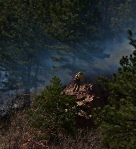Denny DiPaula working the fire on 4th street in Boulder, CO