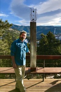 Artist, Denny DiPaula with Making Hay sculpture