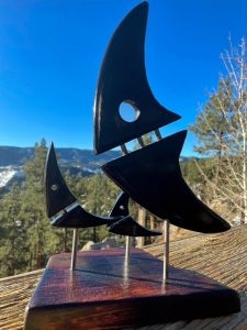 Pelagic I beautifully carved, sanded to silk wood sculpture. Is it a sail boat? Pac Man? Skull?!
